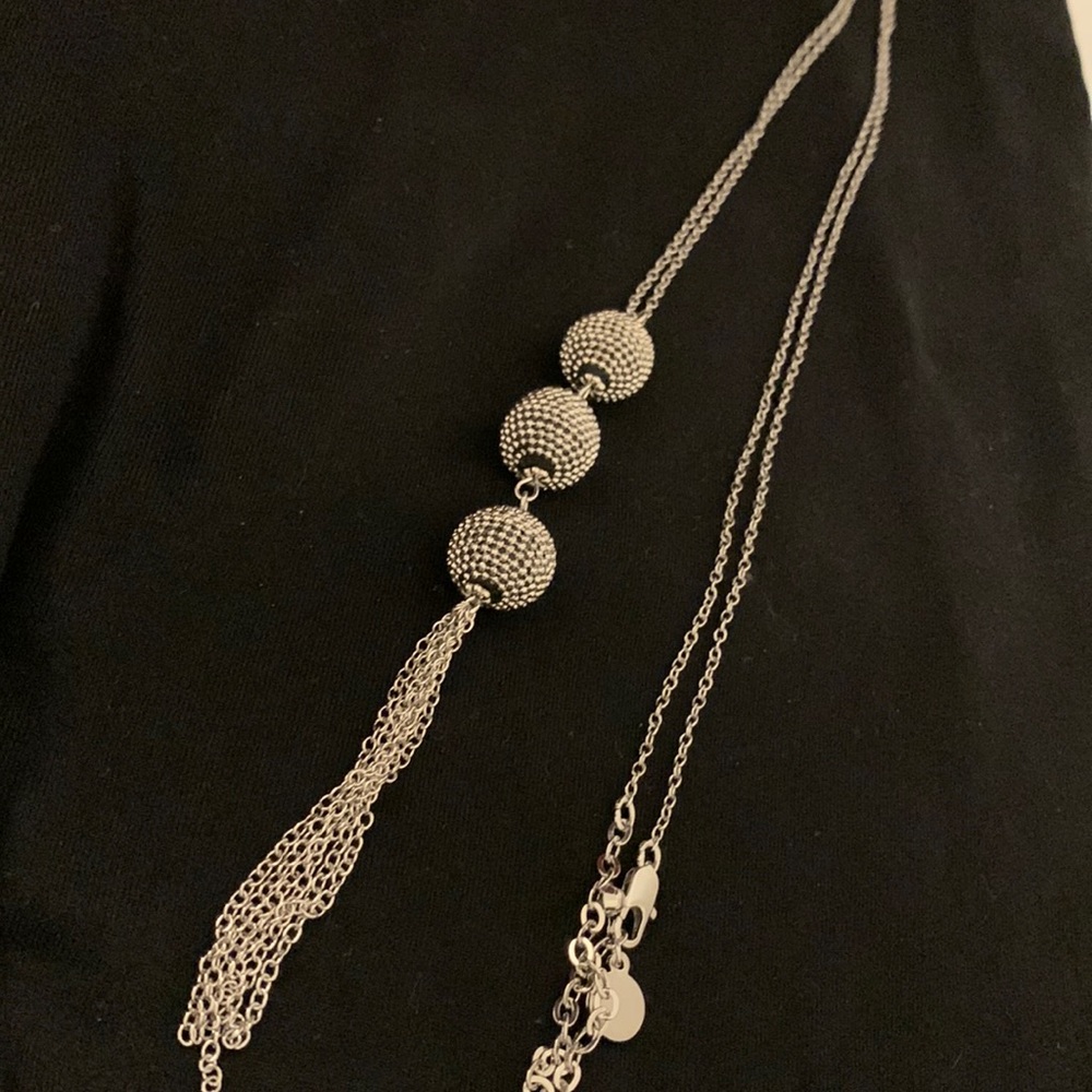 Silver Costume necklace… 27 inches long From clasp to to very bottom. Never worn